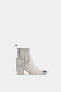 Botines de piel color blanco de moda vaqueros