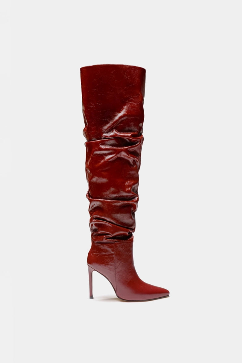 Botas over the knee rojas estilo Rihanna