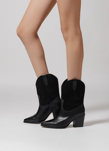 botines de piel color negro con detalles de gamuza en chica delgada