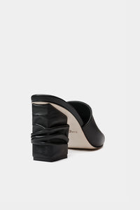 mules de piel de diseñador